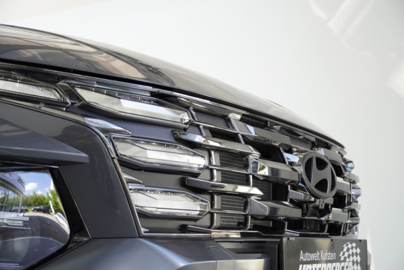 Tucson NX4 Prestige Line 1,6 T-GDi HEV 4WD AT t5hp - 4